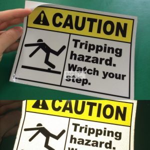 Caution Tripping Hazard. Watch your step. Reflective vinyl sticker